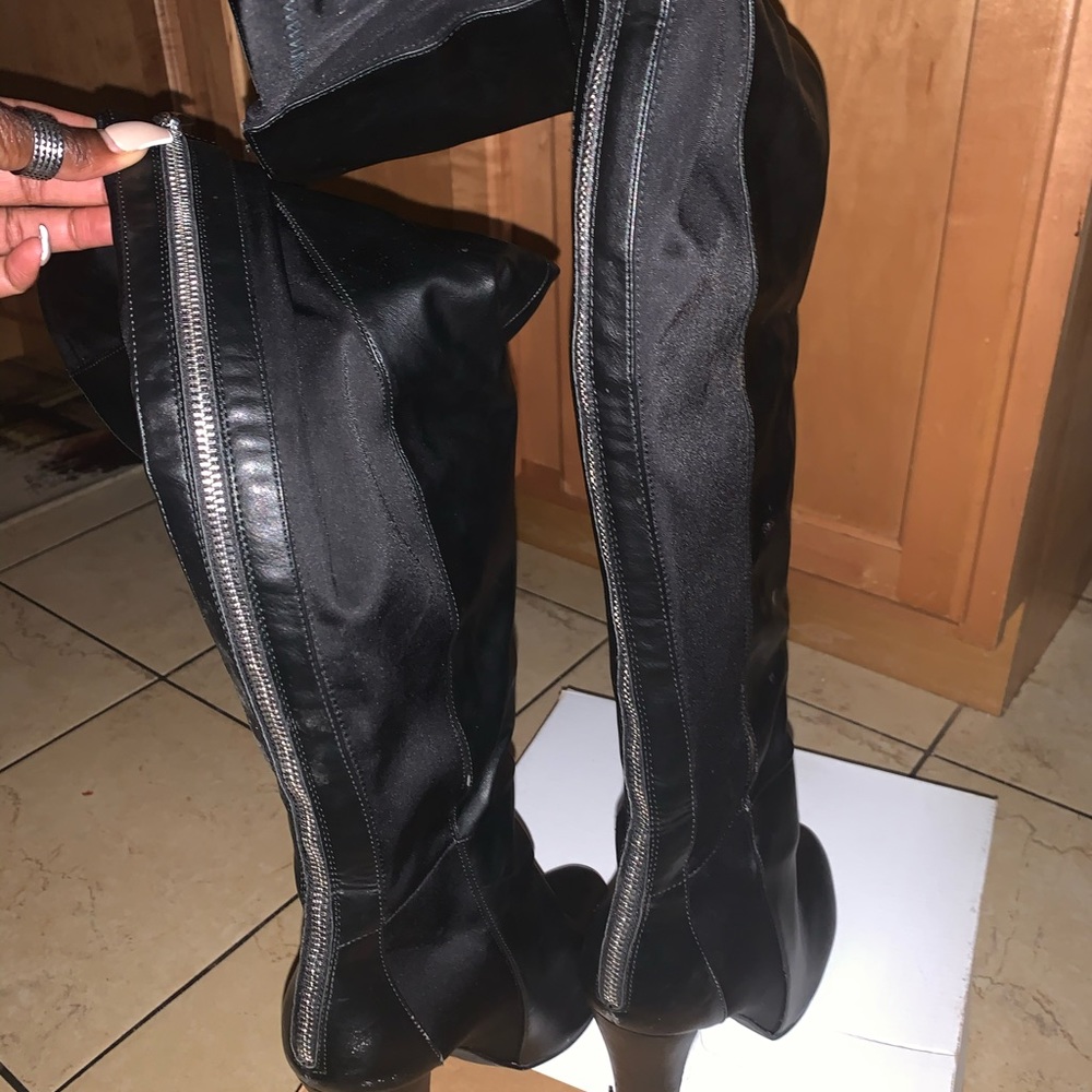 Black thigh high boots